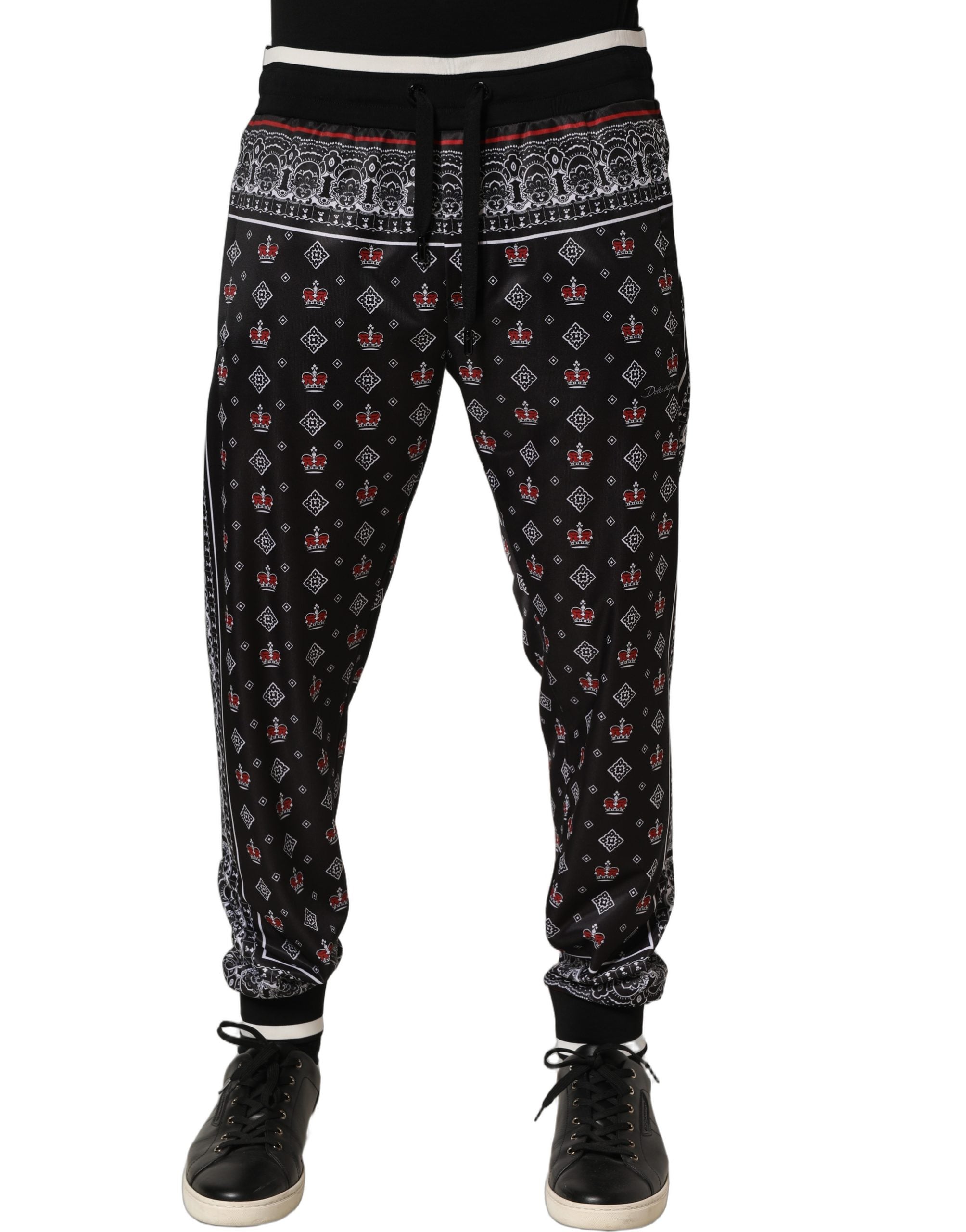 Pantalon jogger noir Dolce & Gabbana pour hommes avec bandeau de couronne, style décontracté et tendance.