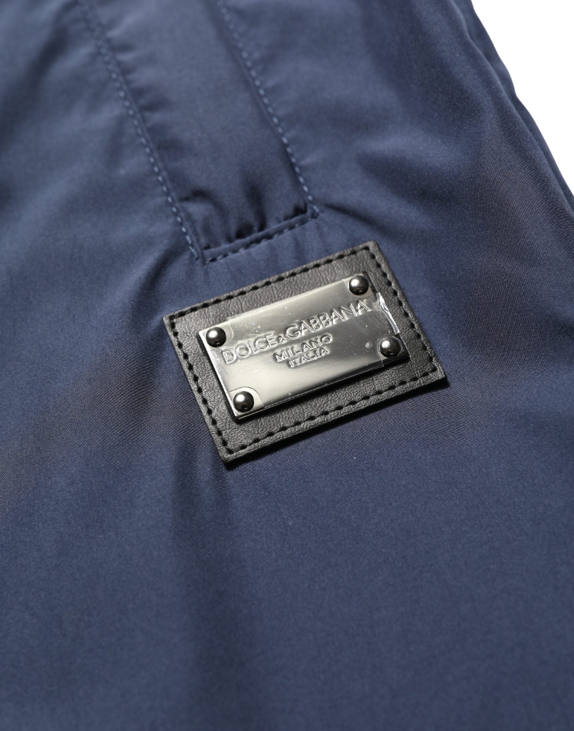 Pantalon jogging en polyester bleu foncé Dolce & Gabbana, style décontracté avec ceinture élastique et poches latérales.