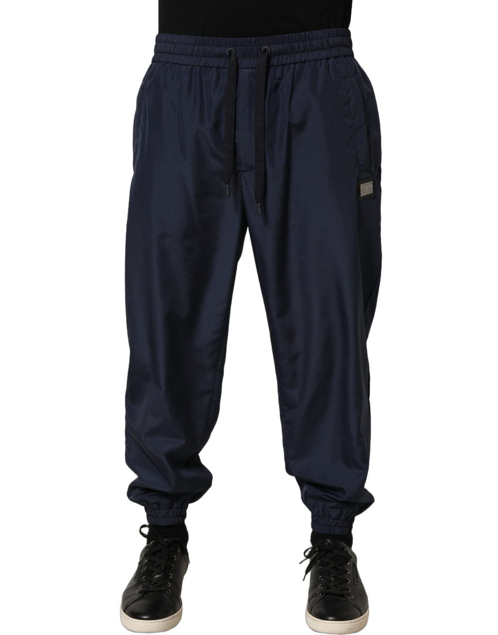 Pantalons de jogging Dolce & Gabbana en polyester bleu foncé, coupe décontractée avec poches et taille élastique.
