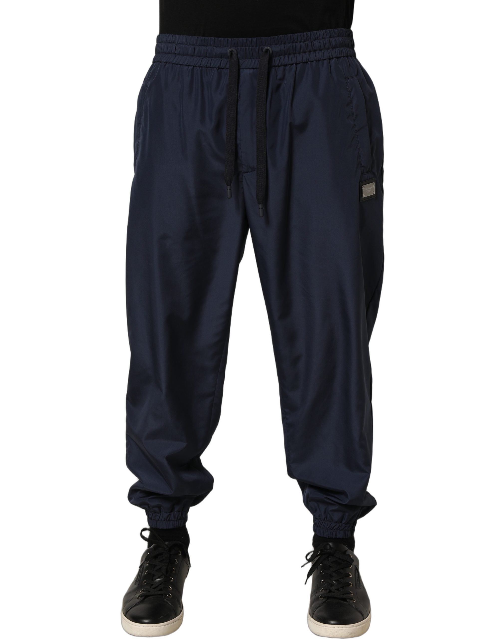 Pantalon de survêtement jogging en polyester bleu foncé Dolce & Gabbana, coupe décontractée avec ceinture élastique.
