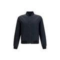 Veste bomber noire en polyamide de Gucci, visible avec détails de design moderne et logo Gucci sur la poitrine.