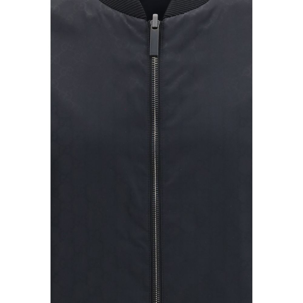 Veste bomber noire en polyamide de Gucci, coupe moderne avec col et poignets élastiques, style élégant et sportif.