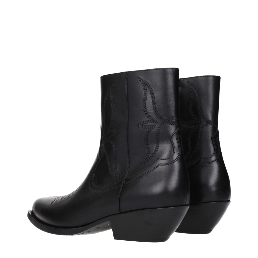 Bottes noires en cuir pour ankle de la marque Celine, avec semelle élégante et design sophistiqué, vue de profil.