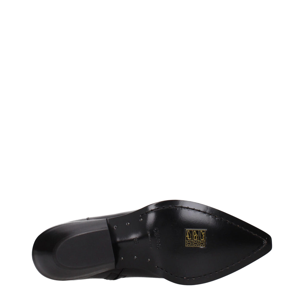 Bottes ankle en cuir noir de la marque Celine, avec semelle élégante et design sophistiqué, parfaites pour un style chic et moderne.