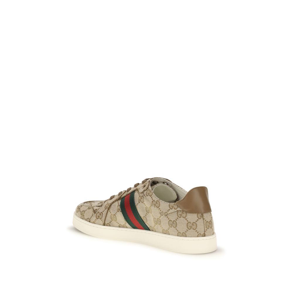 Chaussures de sport Gucci beige en tissu avec semelle blanche, baskets athlétiques élégantes et confortables.