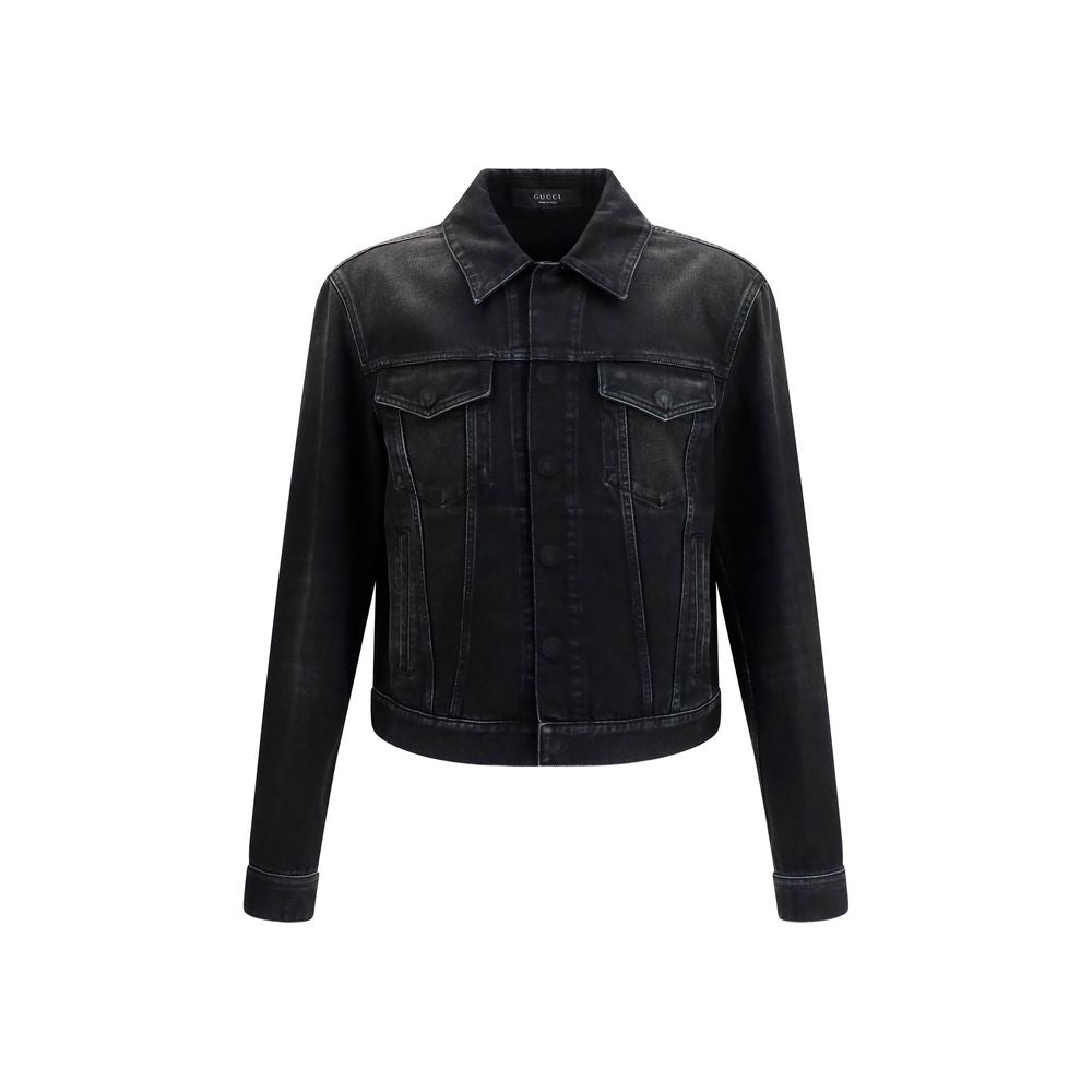 Veste en denim en coton bleu Gucci, classique et élégante, avec détails de marque visibles sur la veste.