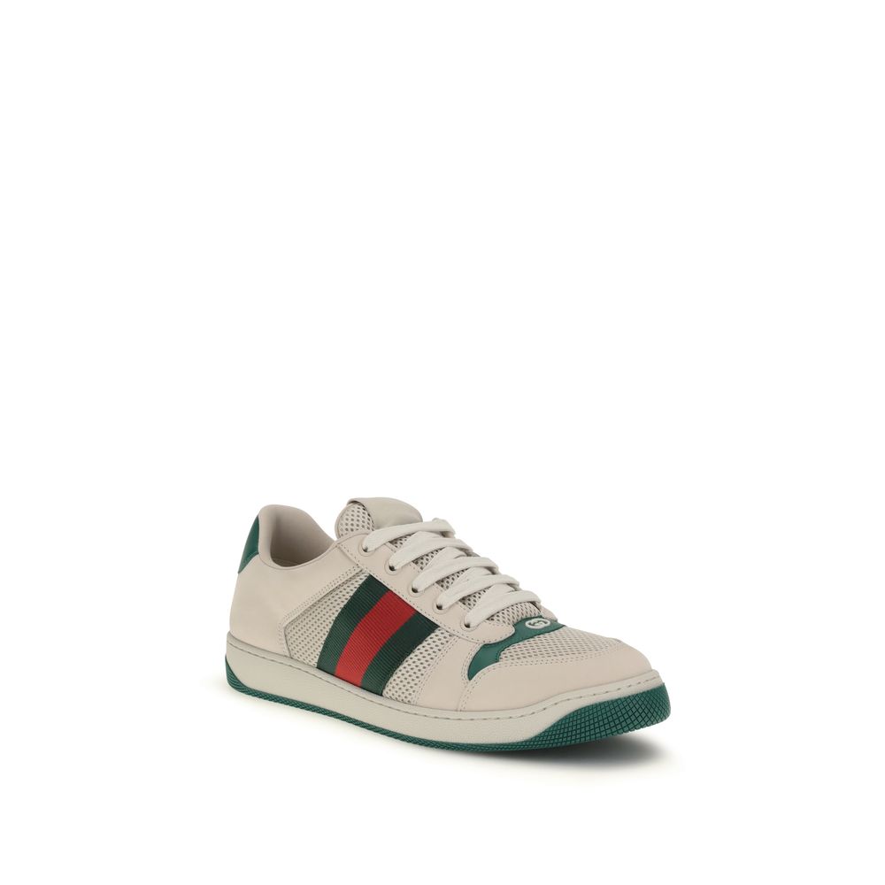 Chaussures de sport Gucci beiges en polyester avec semelles blanches, style athlétique et design moderne.