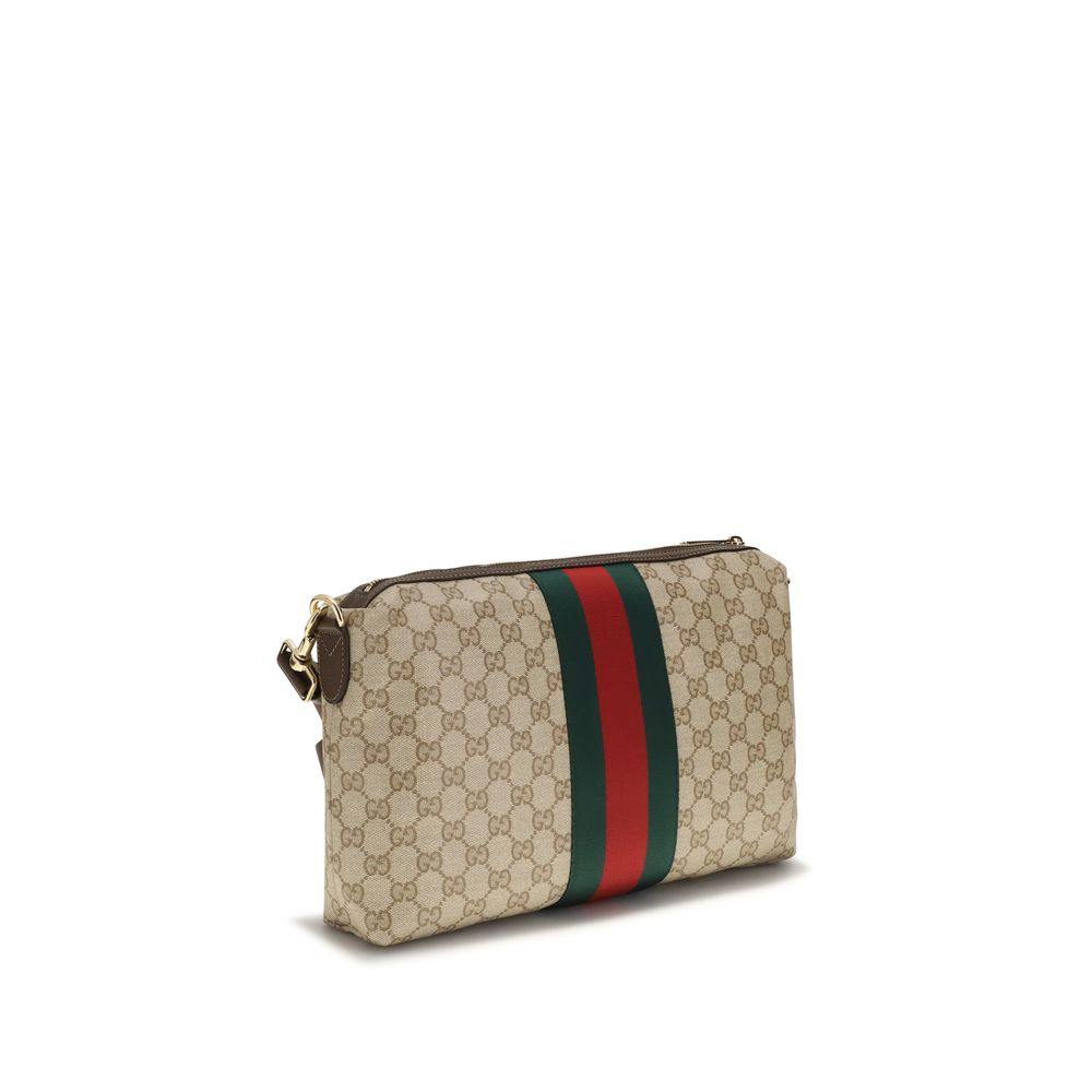 Sac à bandoulière en coton beige Gucci, élégant et spacieux, avec détails de la marque et finition raffinée.