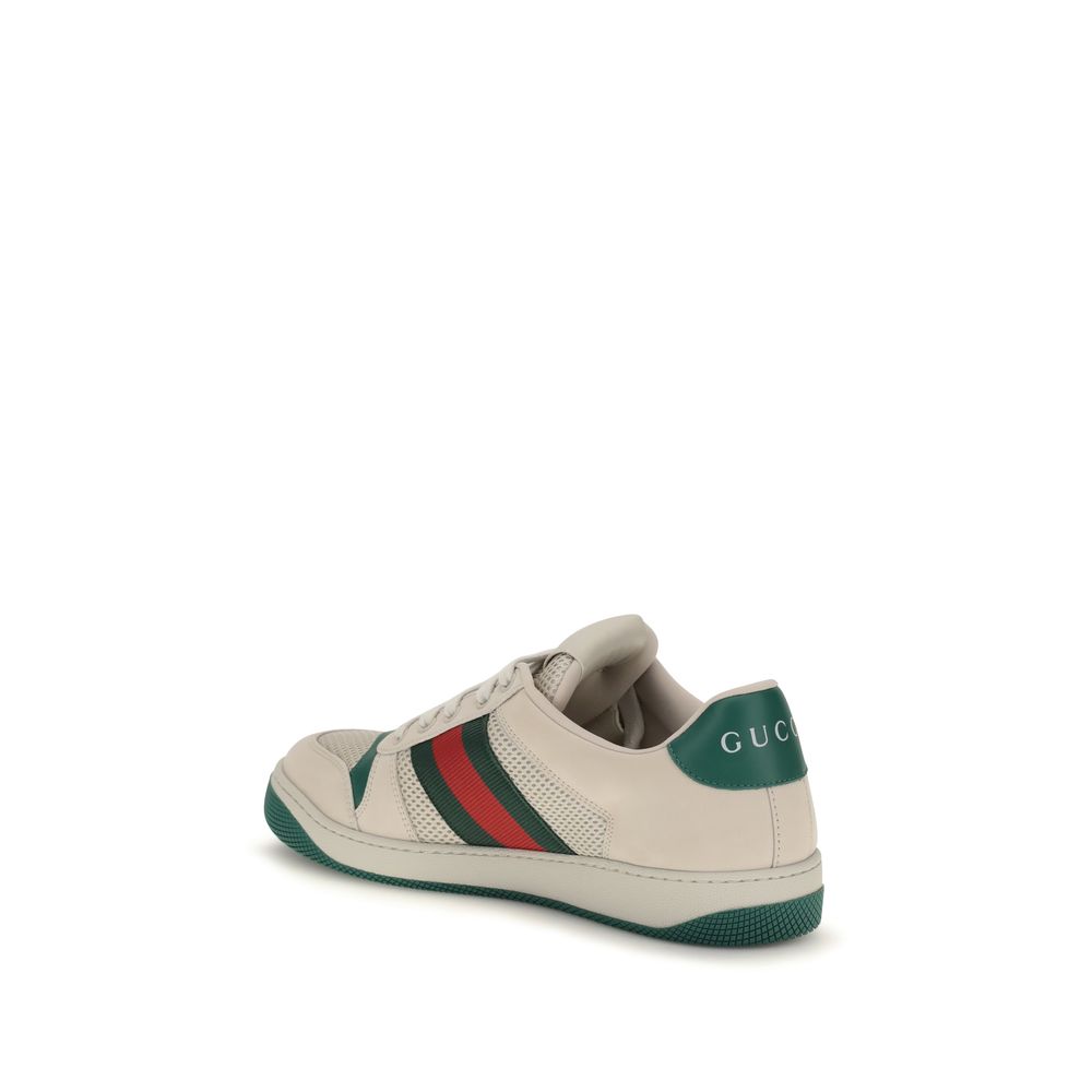 Chaussures de sport en polyester beige Gucci, baskets athlétiques élégantes avec design moderne et logo Gucci visible.