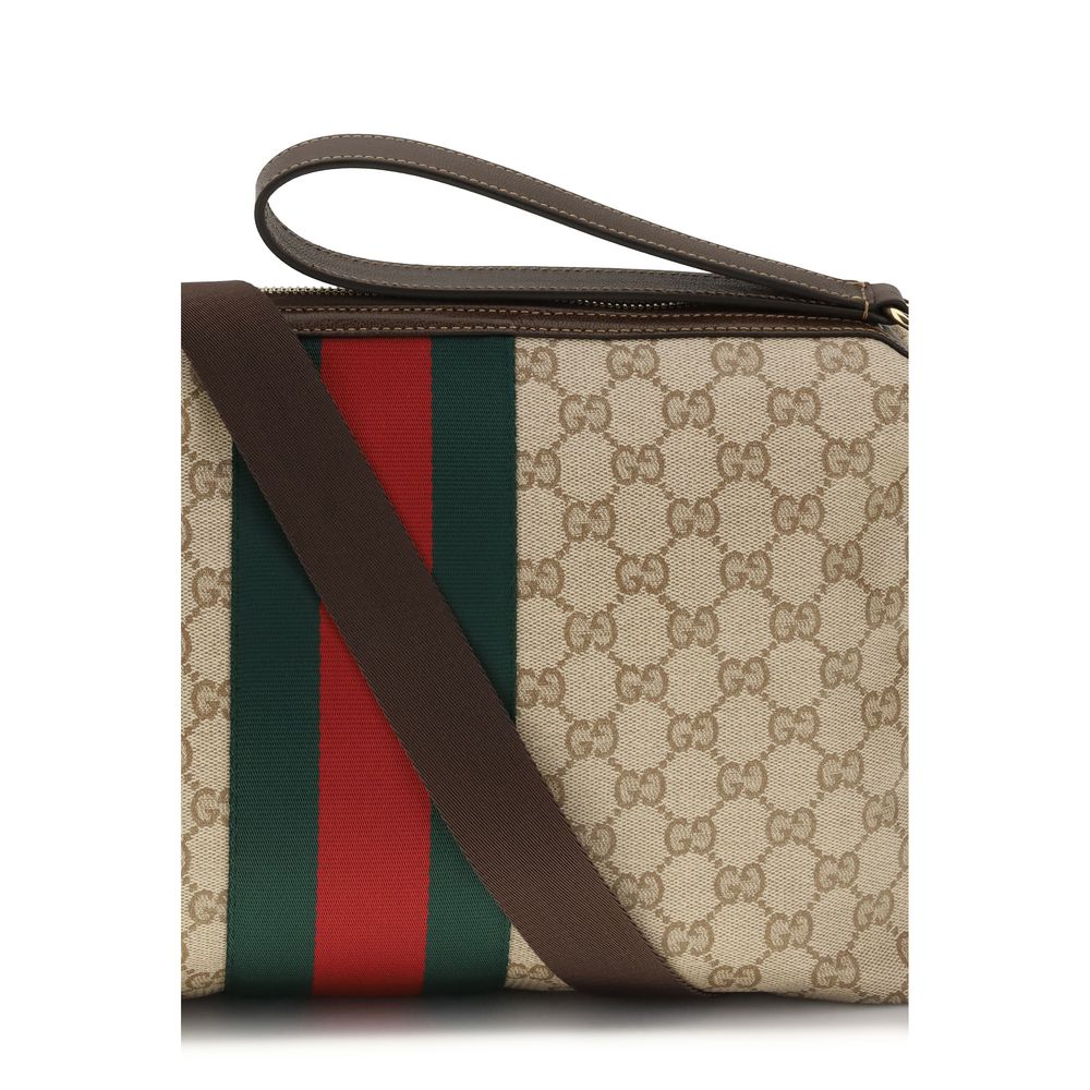 Sac à bandoulière en coton beige Gucci, élégant et spacieux, avec détails signature de la marque.