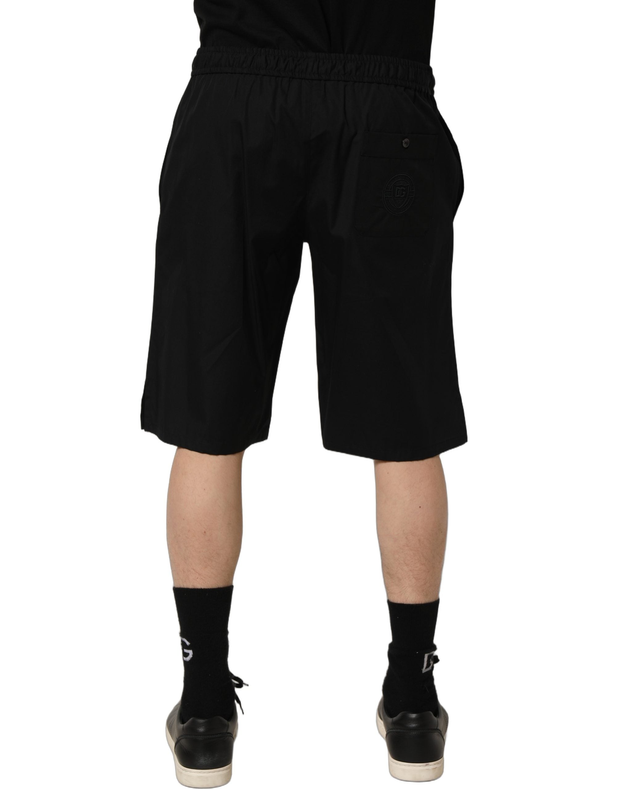Shorts bermuda en coton noir pour homme de Dolce & Gabbana, sweatshorts décontractés avec logo visible.