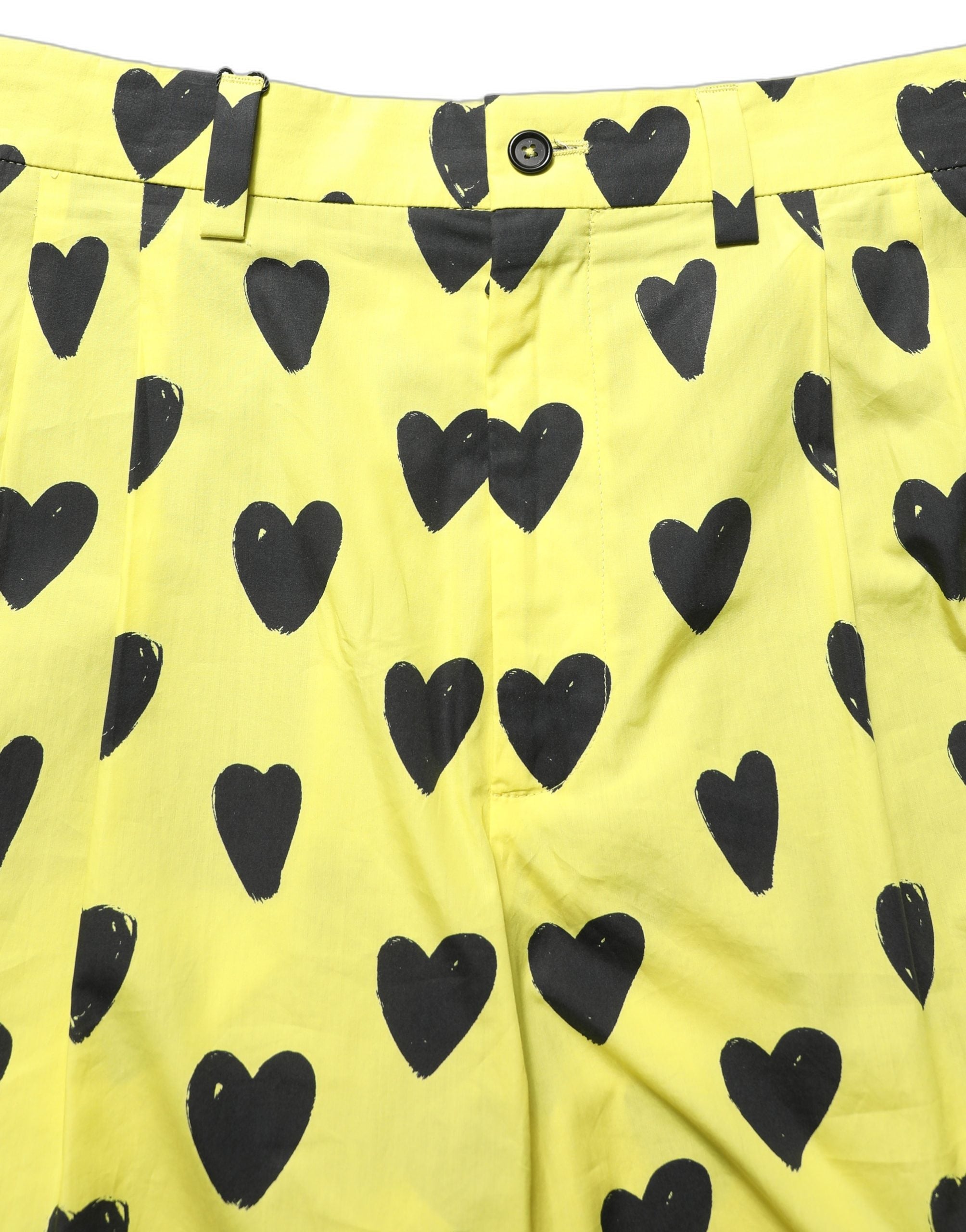Shorts bermuda pour homme Dolce & Gabbana en coton jaune avec imprimé de cœurs, style décontracté et élégant.