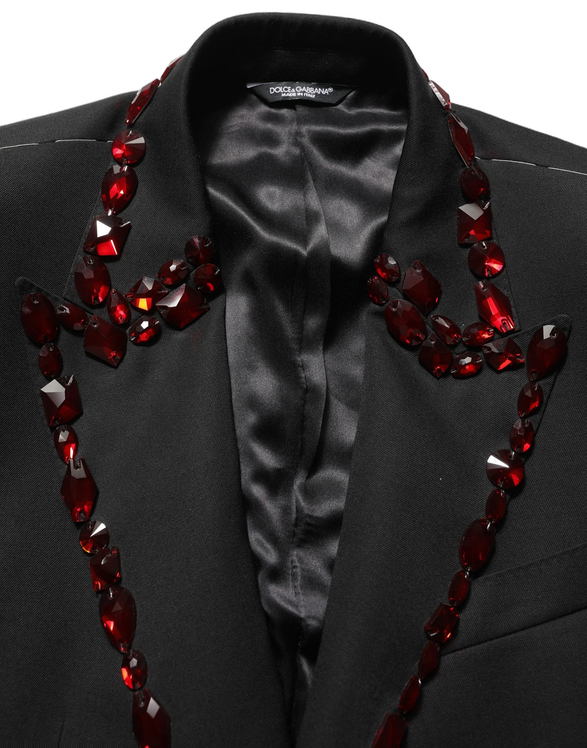 Costume deux pièces en laine noire Dolce & Gabbana avec embellissements en cristal, vue détaillée du tailleur élégant.