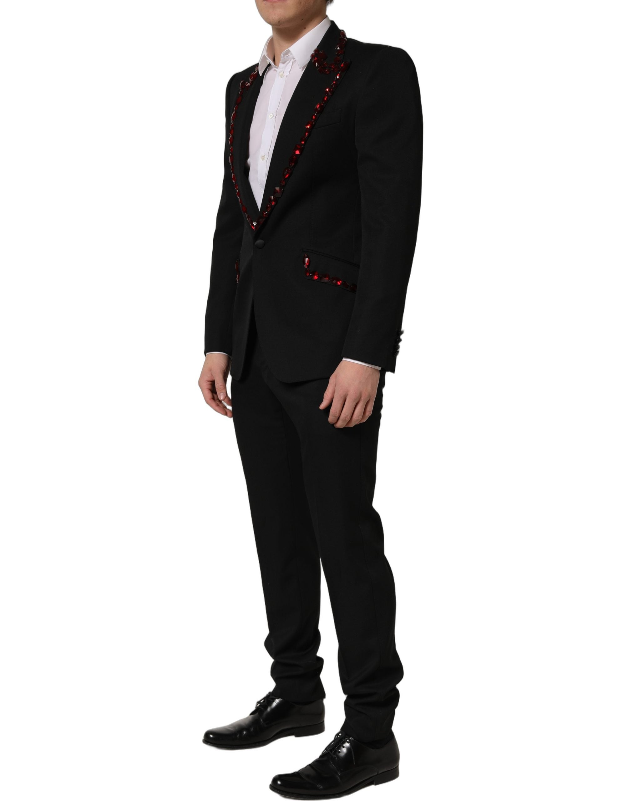 Costume deux pièces en laine noire Dolce & Gabbana avec embellissements en cristal, veste et pantalon élégants.