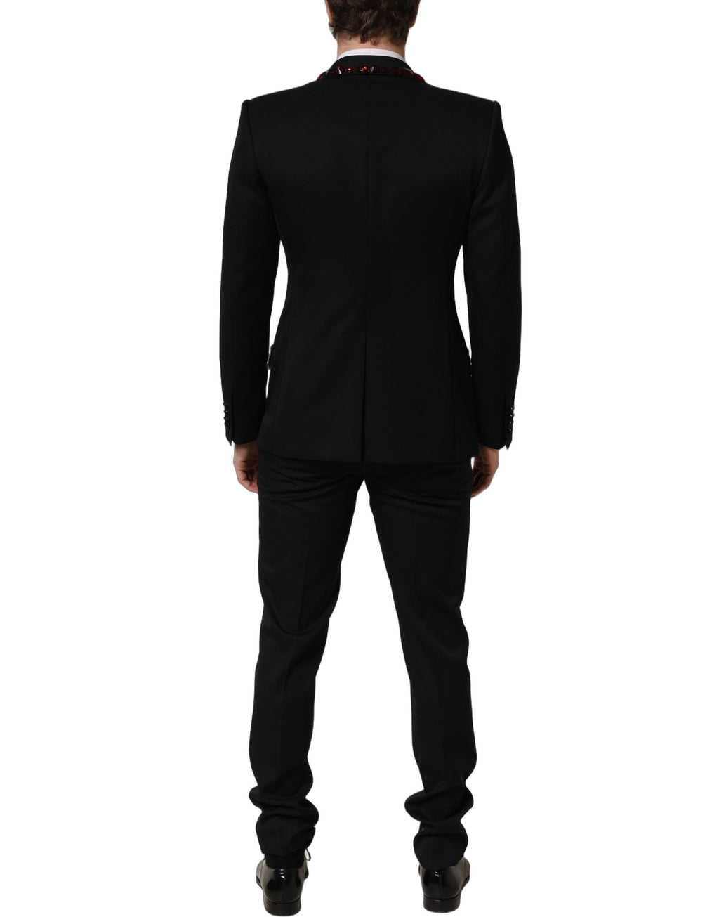 Costume deux pièces Dolce & Gabbana en laine noire avec cristaux, comprenant une veste et un pantalon élégants.