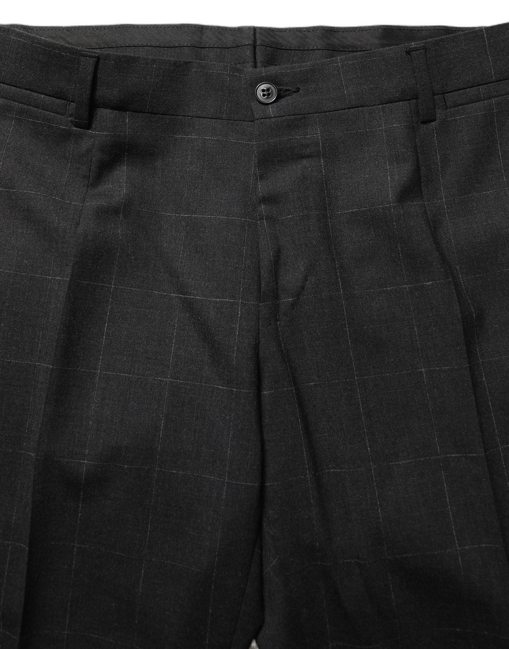 Costume homme en laine noire Dolce & Gabbana, costume deux pièces ajusté pour occasions formelles.