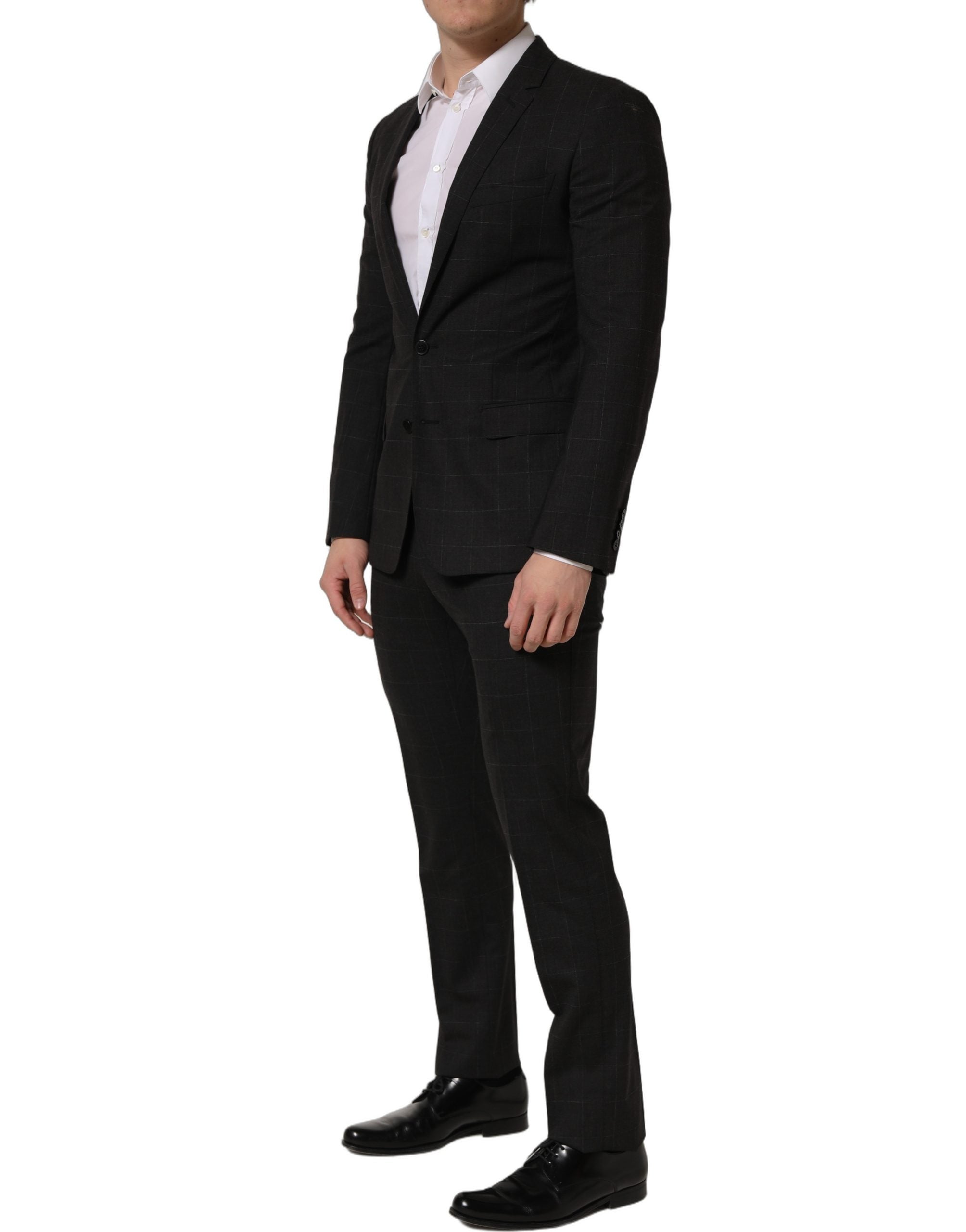 Costume deux pièces pour hommes en laine noire Dolce & Gabbana, coupe slim, costume formel élégant, veste et pantalon assortis.