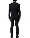Costume homme Dolce & Gabbana en laine noire, trois pièces, coupe slim, costume formel élégant, image montrant la veste, le gilet et le pantalon.