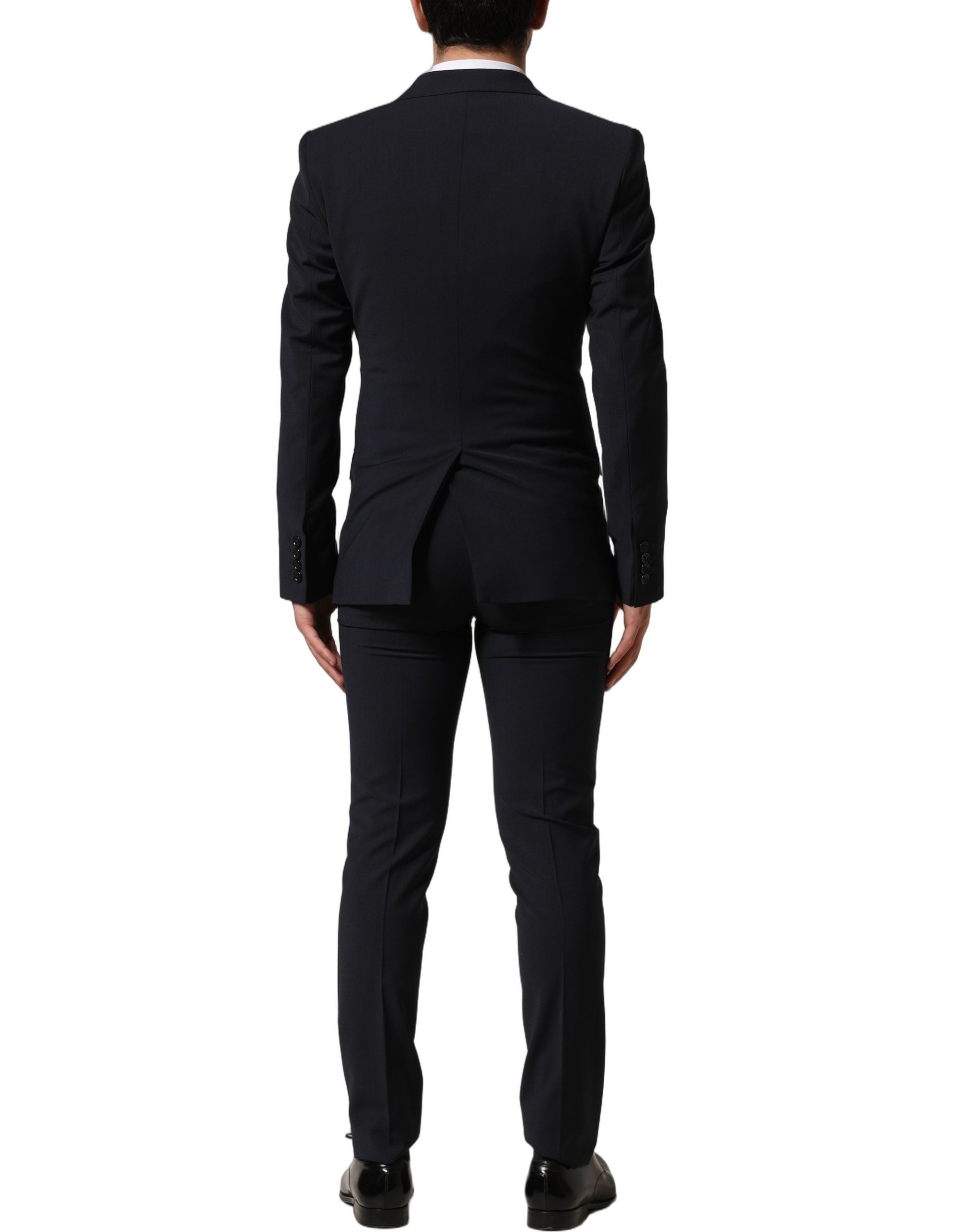Costume homme Dolce & Gabbana en laine noire, trois pièces, coupe slim, costume formel élégant, image montrant la veste, le gilet et le pantalon.