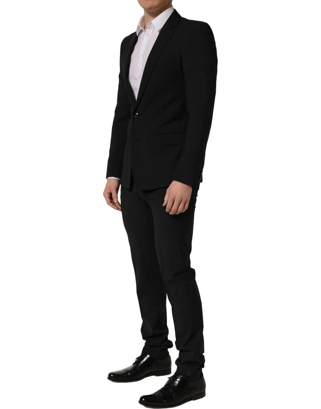 Costume homme Dolce & Gabbana en laine noire, costume deux pièces ajusté pour occasions formelles, style élégant et moderne.