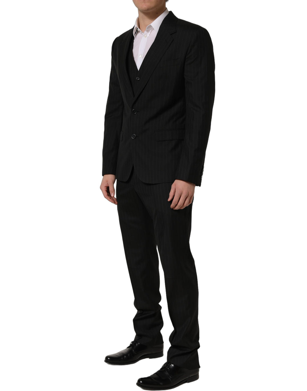 Costume noir Dolce & Gabbana à rayures, costume trois pièces ajusté pour homme, élégant et formel.