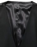 Costume homme trois pièces en laine noire Dolce & Gabbana, costume formel ajusté, veste, pantalon et gilet élégants.