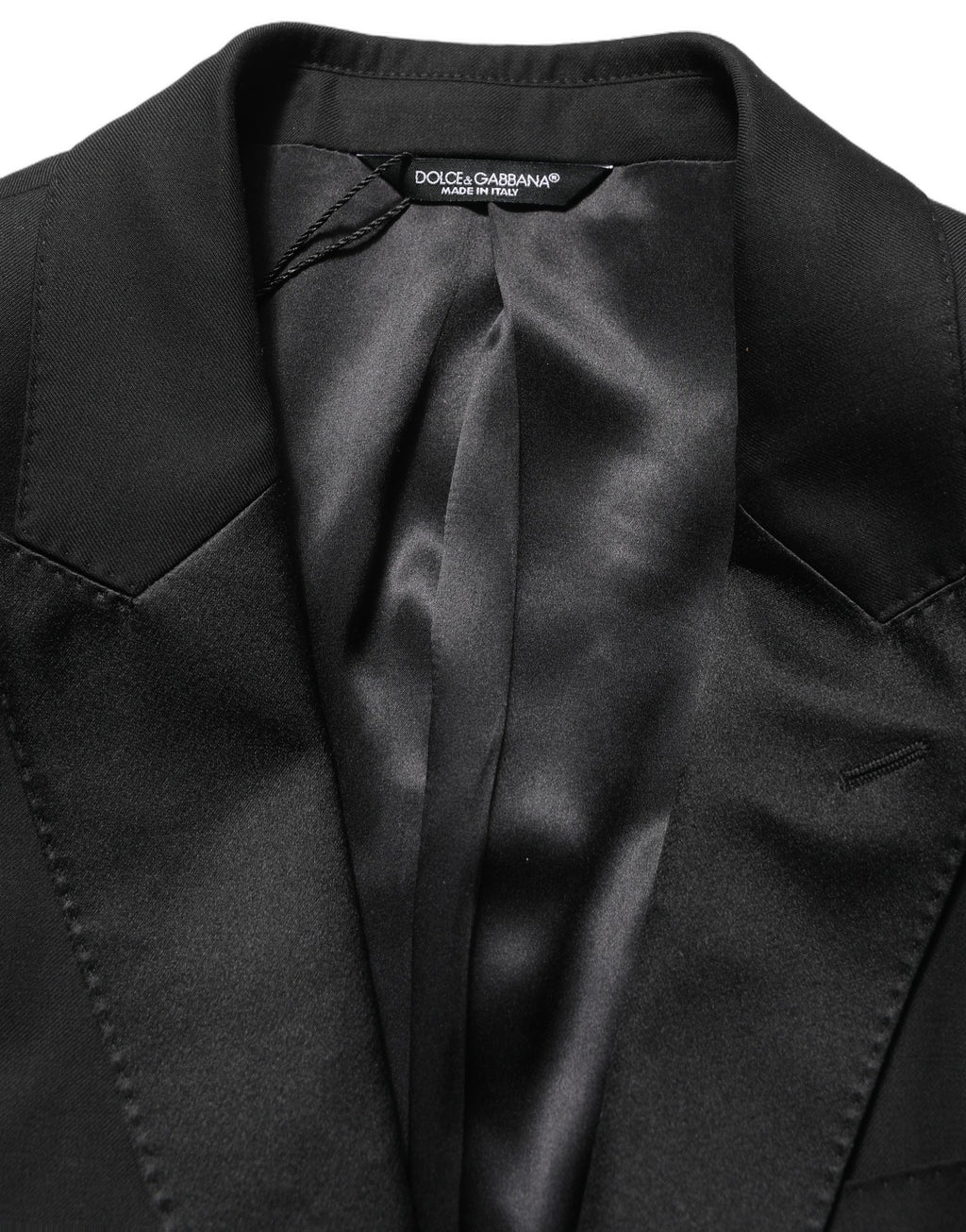 Costume homme Dolce & Gabbana en laine noire, costume deux pièces ajusté, idéal pour occasions formelles.