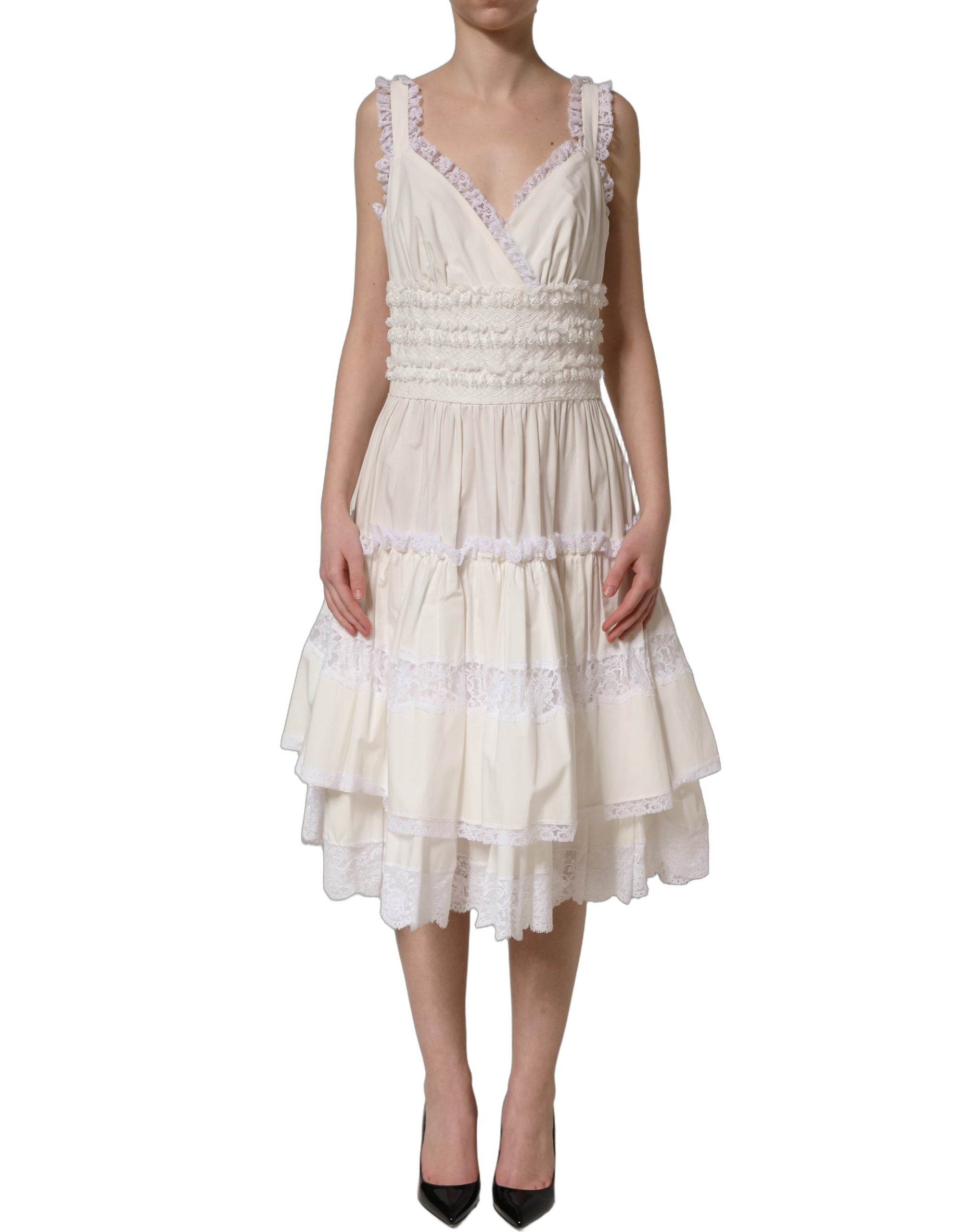 Robe midi blanche en coton popeline avec volants de Dolce & Gabbana, élégante et fluide, parfaite pour une tenue chic et raffinée.