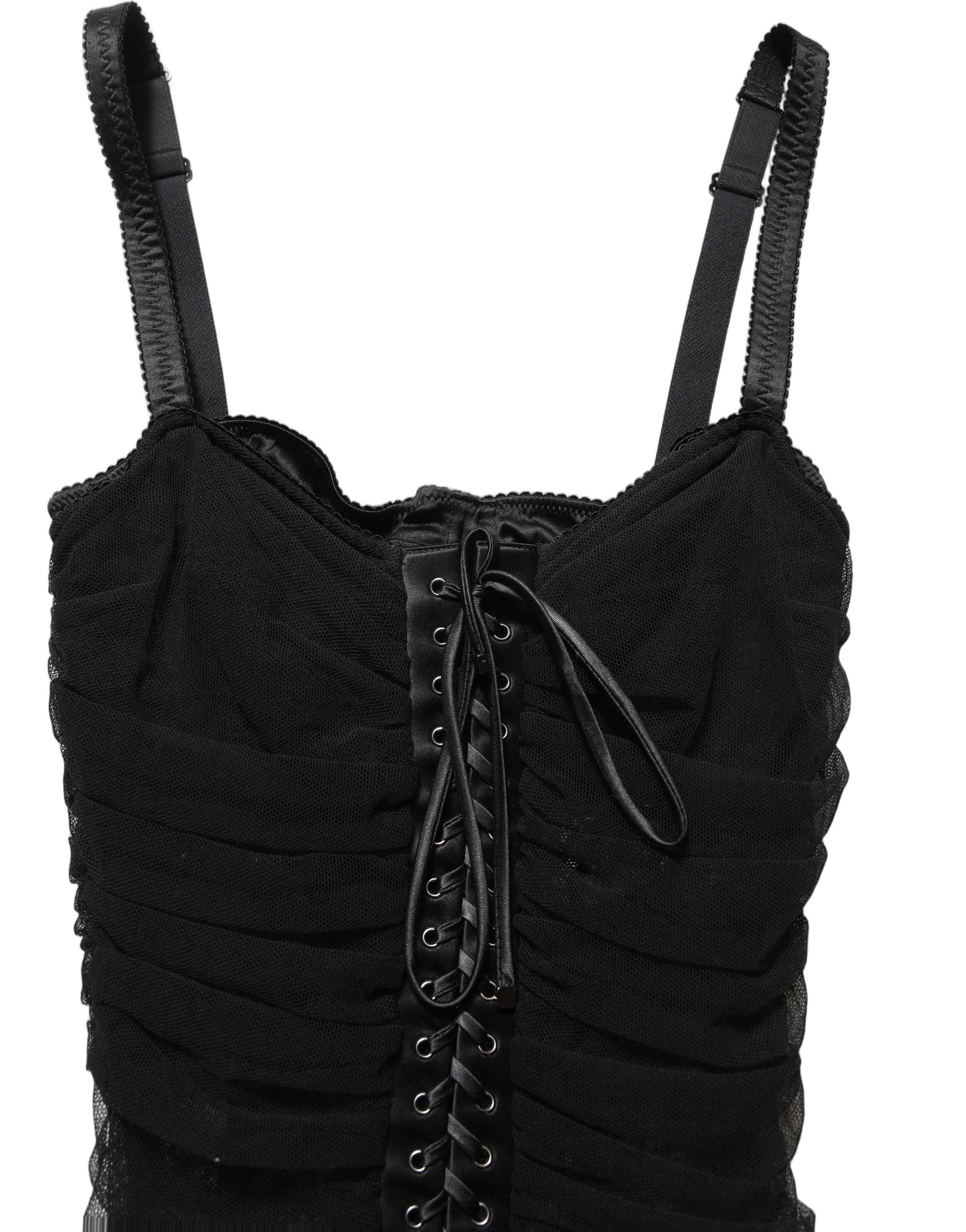 Robe courte noire Dolce & Gabbana style corset moulant, silhouette élégante et ajustée, en tissu satiné.