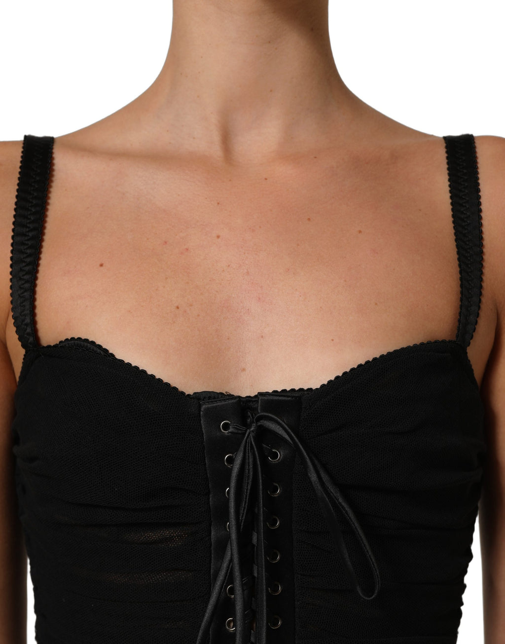 Robe courte noire Dolce & Gabbana style corset moulante, silhouette ajustée et élégante, en tissu satiné.