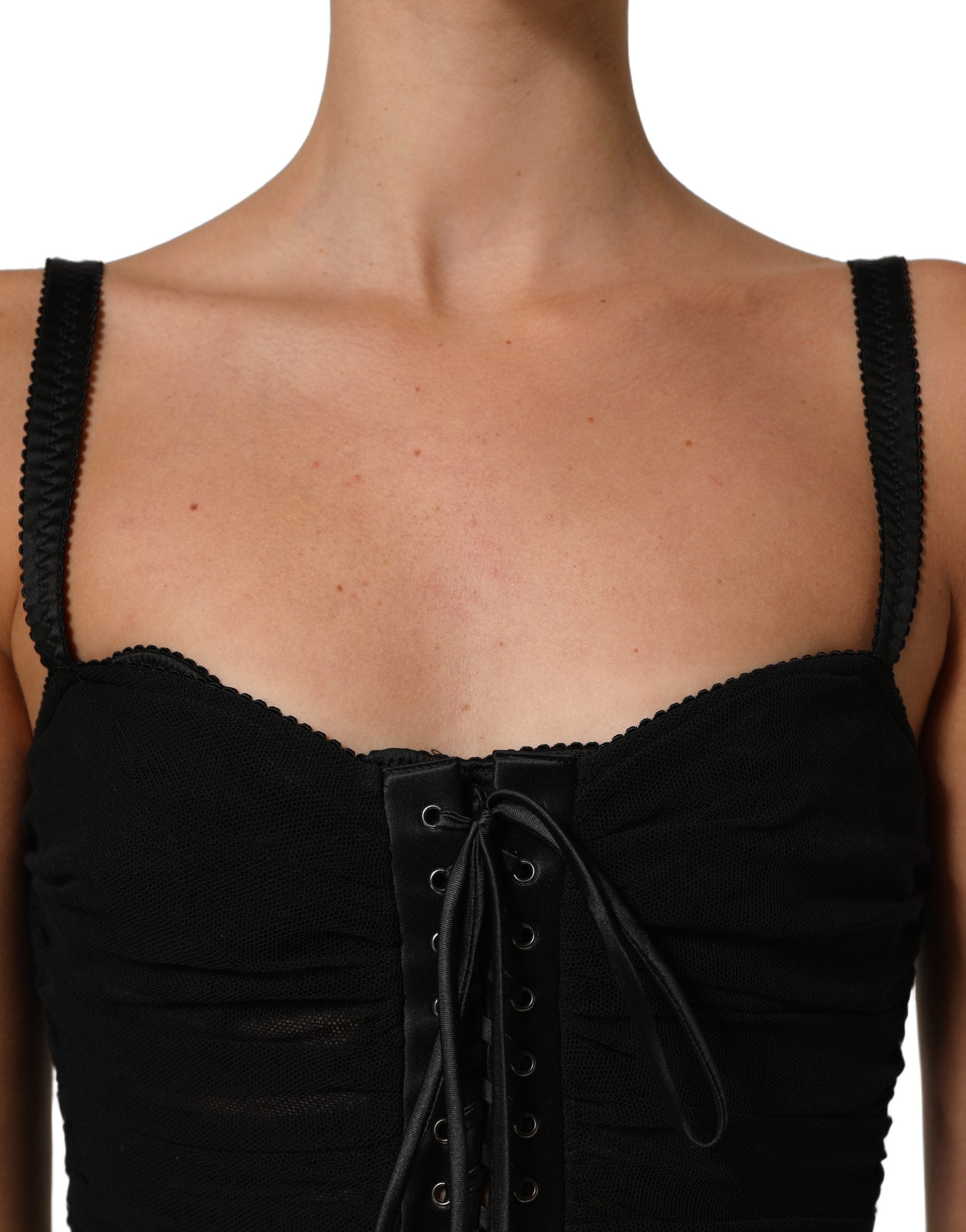 Robe courte noire Dolce & Gabbana style corset moulante, silhouette ajustée et élégante, en tissu satiné.