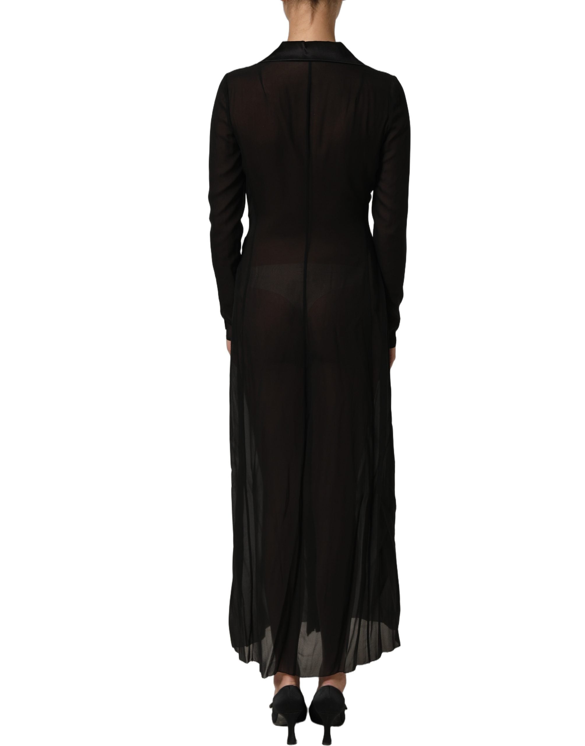Robe longue noire en soie et chiffon transparent de Dolce & Gabbana, style élégant et fluide, port de face avec détails de tissu.