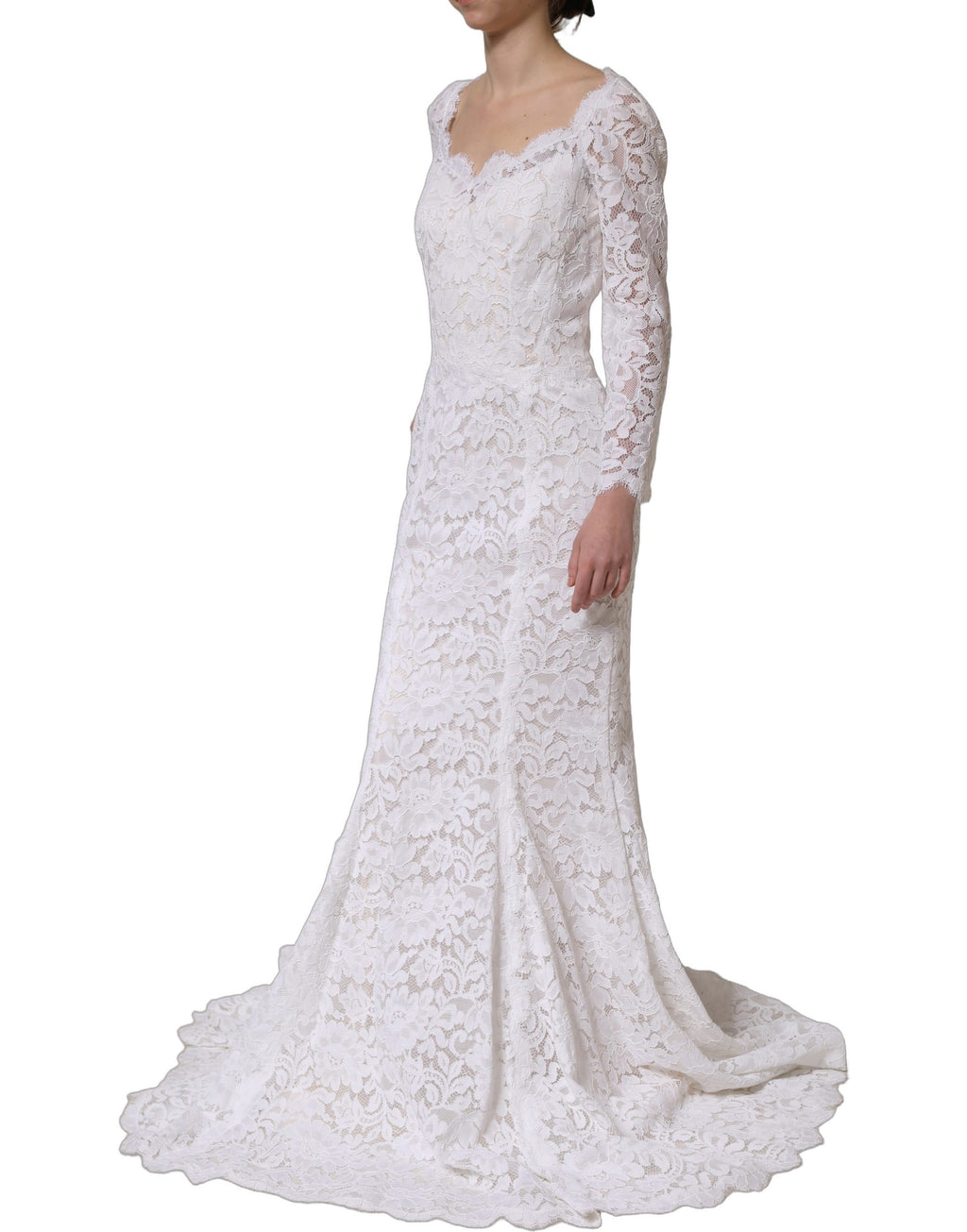 Robe longue sirène en dentelle blanche à fleurs, Dolce & Gabbana, élégante robe de soirée avec détails floraux raffinés.