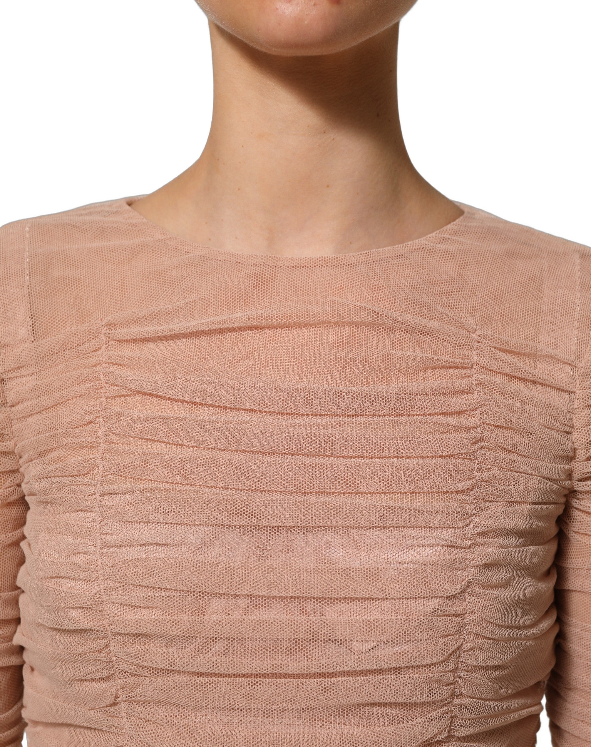 Robe midi en coton beige à mailles, coupe ajustée et drapée, de la marque Dolce & Gabbana, vue en gros plan.
