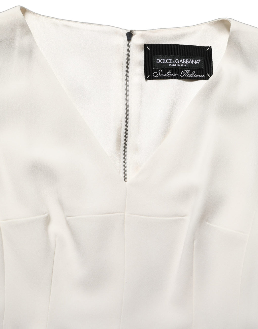 Robe midi sans manches Dolce & Gabbana à motif léopard blanc, coupe ajustée et élégante, parfaite pour une occasion chic.