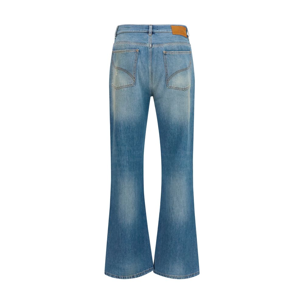 Jeans évasés en coton bleu de la marque Amiri, style décontracté avec coupe large et détails modernes.