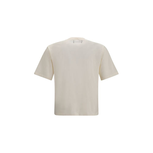 T-shirt beige en coton de la marque Amiri, coupe classique, porté sur mannequin, détail du col rond.