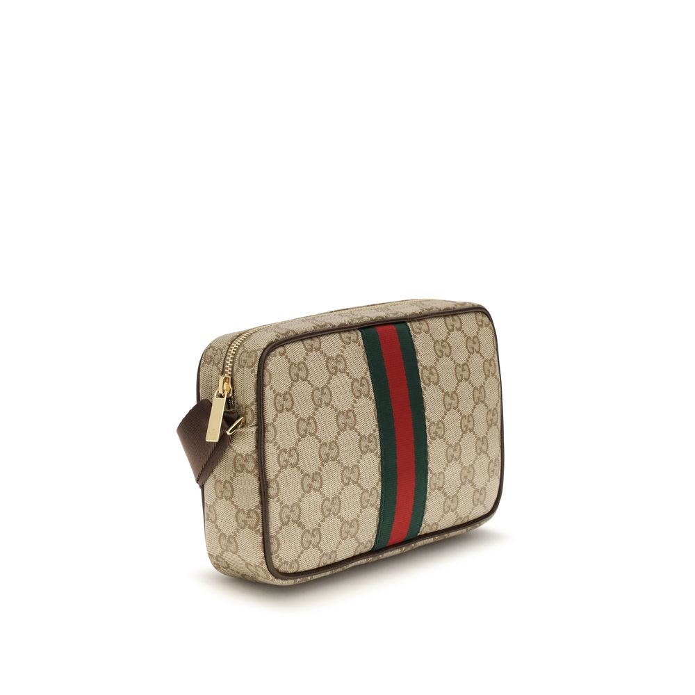 Sac à bandoulière en coton beige de Gucci, élégant et spacieux, avec détails signature de la marque.