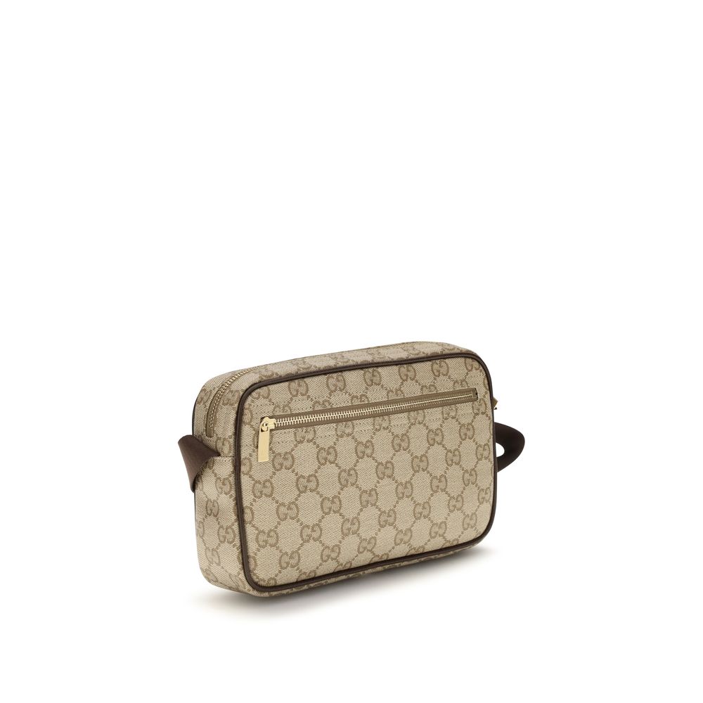 Sac à bandoulière en coton beige de Gucci avec détails élégants et logo de la marque visible.