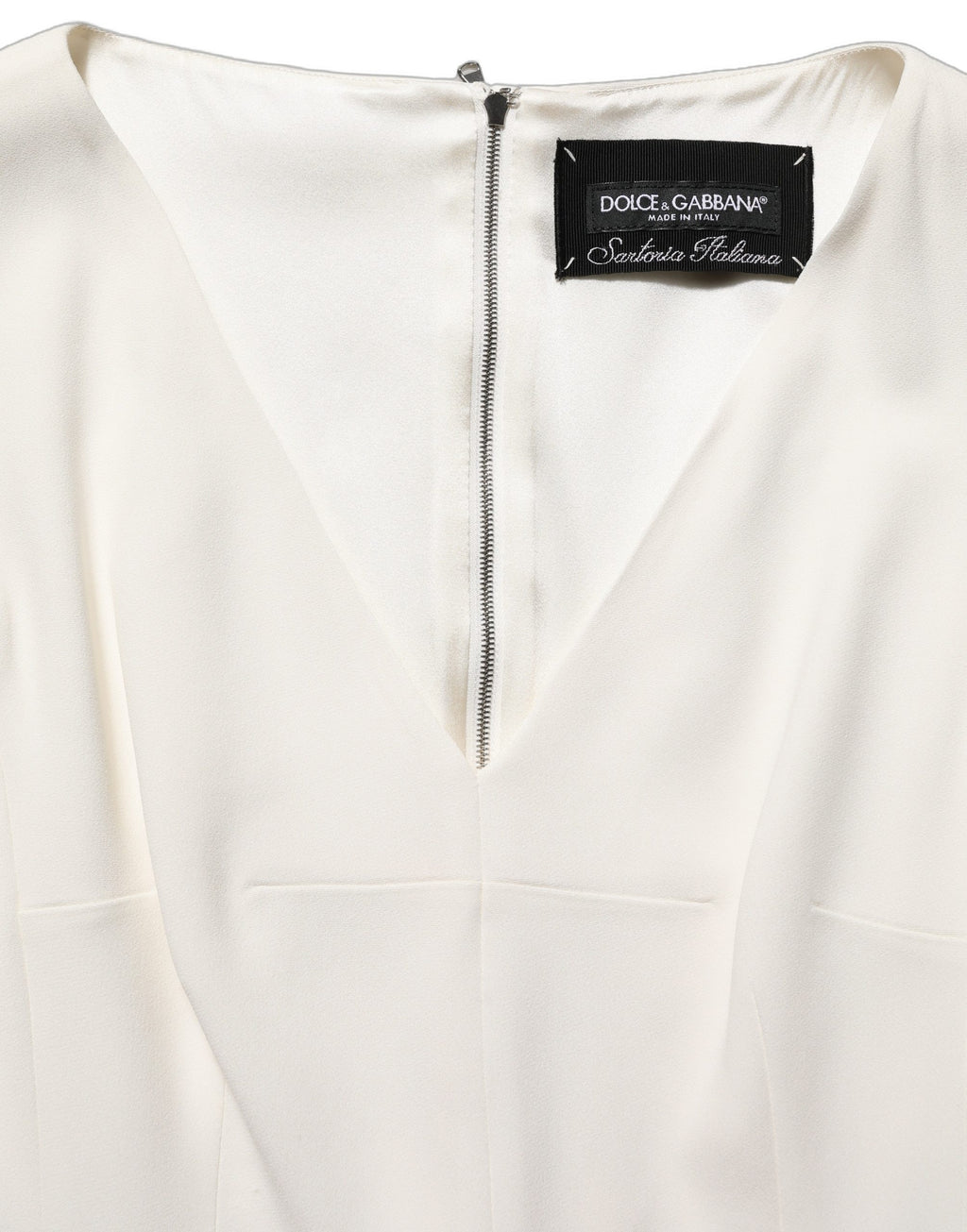 Robe droite sans manches Dolce & Gabbana blanche à imprimé léopard, longueur midi, élégante et sophistiquée.