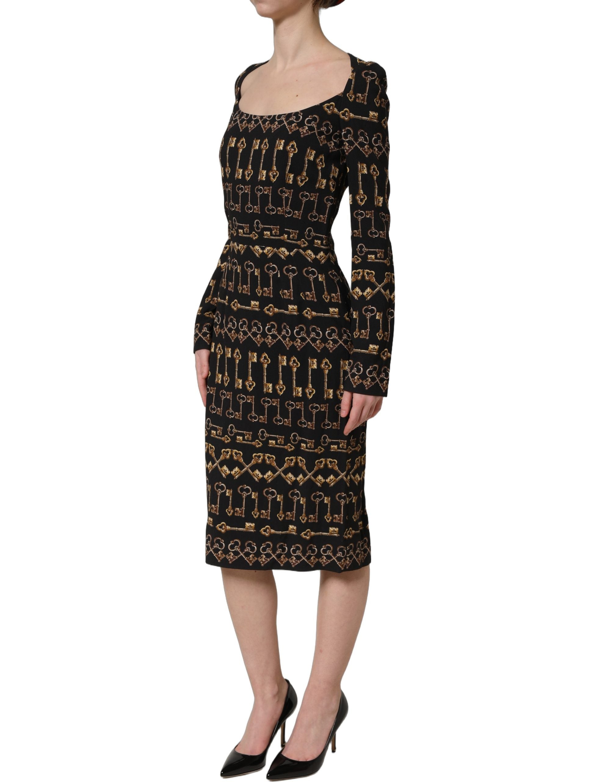 Robe midi noire à manches longues Dolce & Gabbana avec motif clé, coupe ajustée et élégante pour femme.