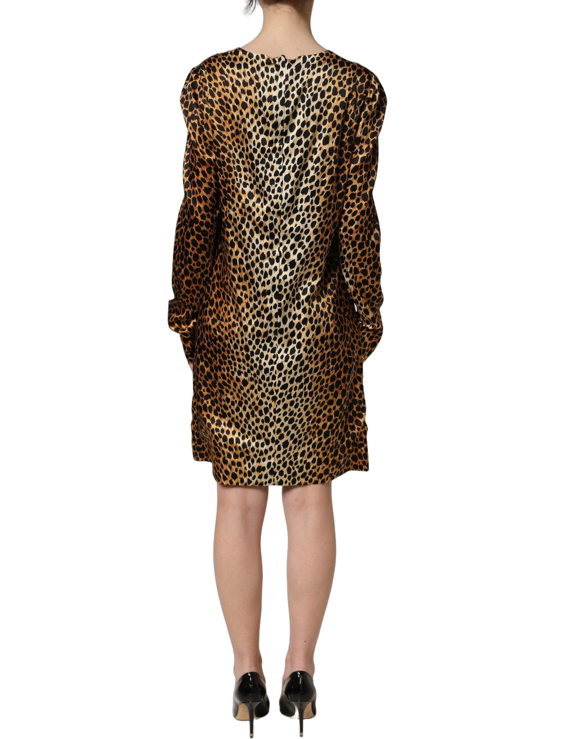 Robe courte Dolce & Gabbana en imprimerie ocelot marron à manches longues, style élégant et tendance.