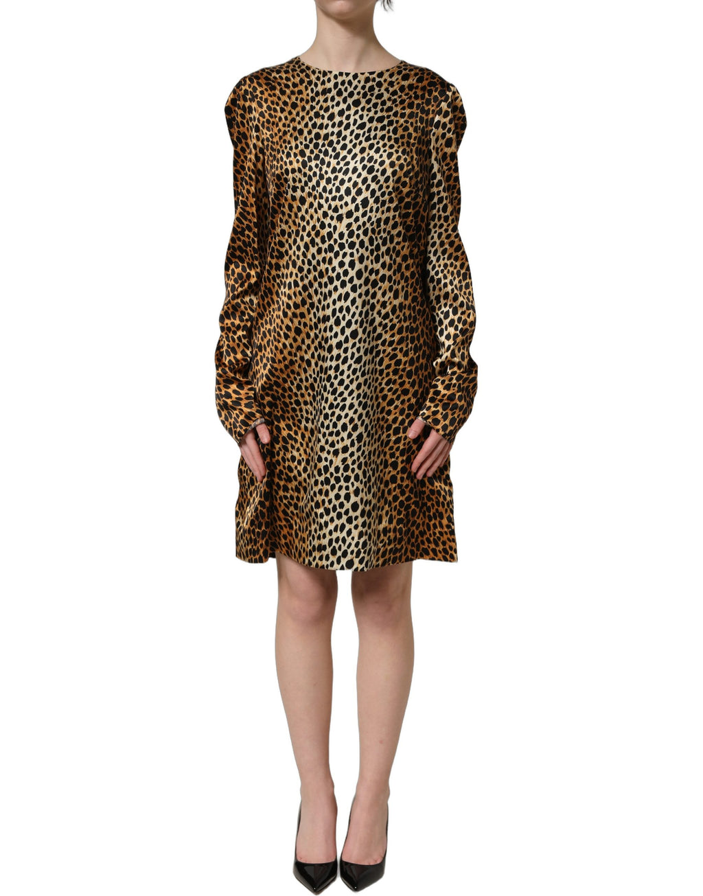 Robe courte Dolce & Gabbana à manches longues avec imprimé léopard ocelot marron, style élégant et tendance.