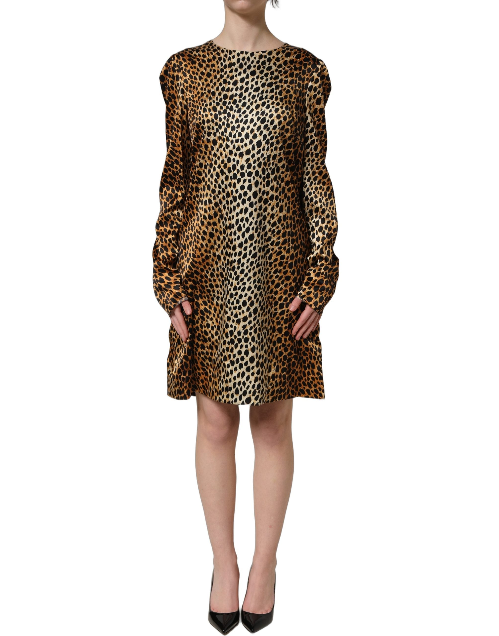 Robe courte Dolce & Gabbana à manches longues avec imprimé léopard ocelot marron, style élégant et tendance.