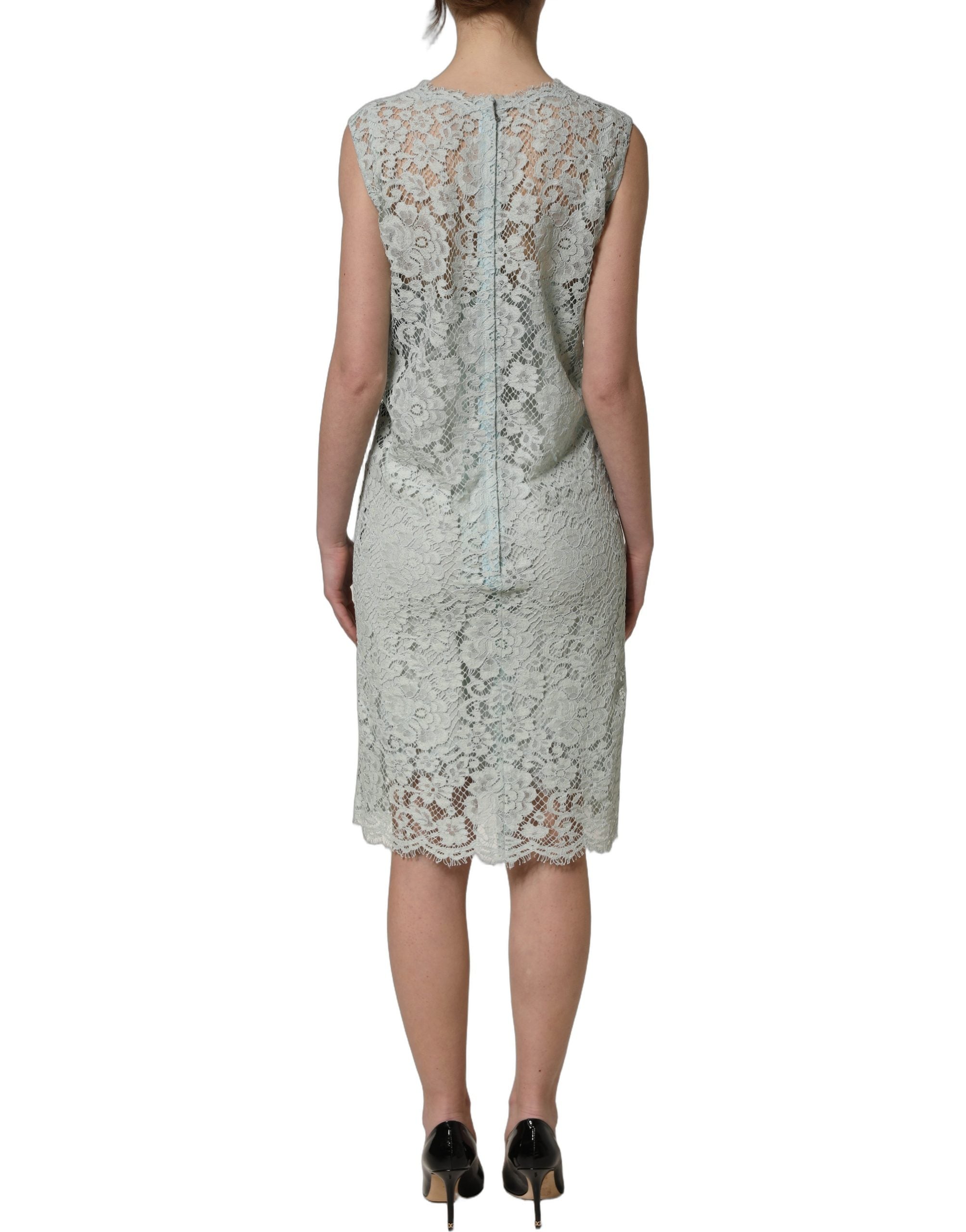 Robe sans manches en dentelle vert menthe de Dolce & Gabbana, longueur genou, élégante et sophistiquée.