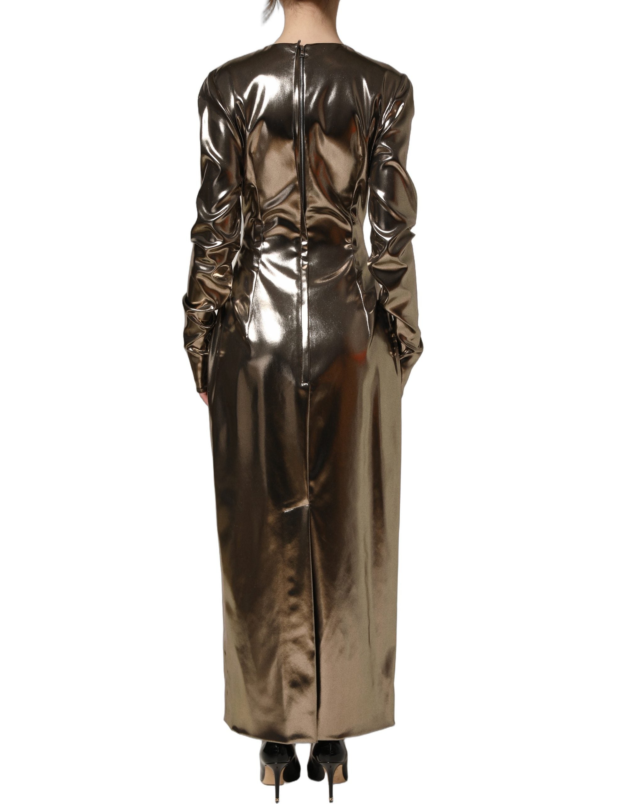 Robe longue en polyester doré métallique Dolce & Gabbana à manches longues, style élégant et sophistiqué.