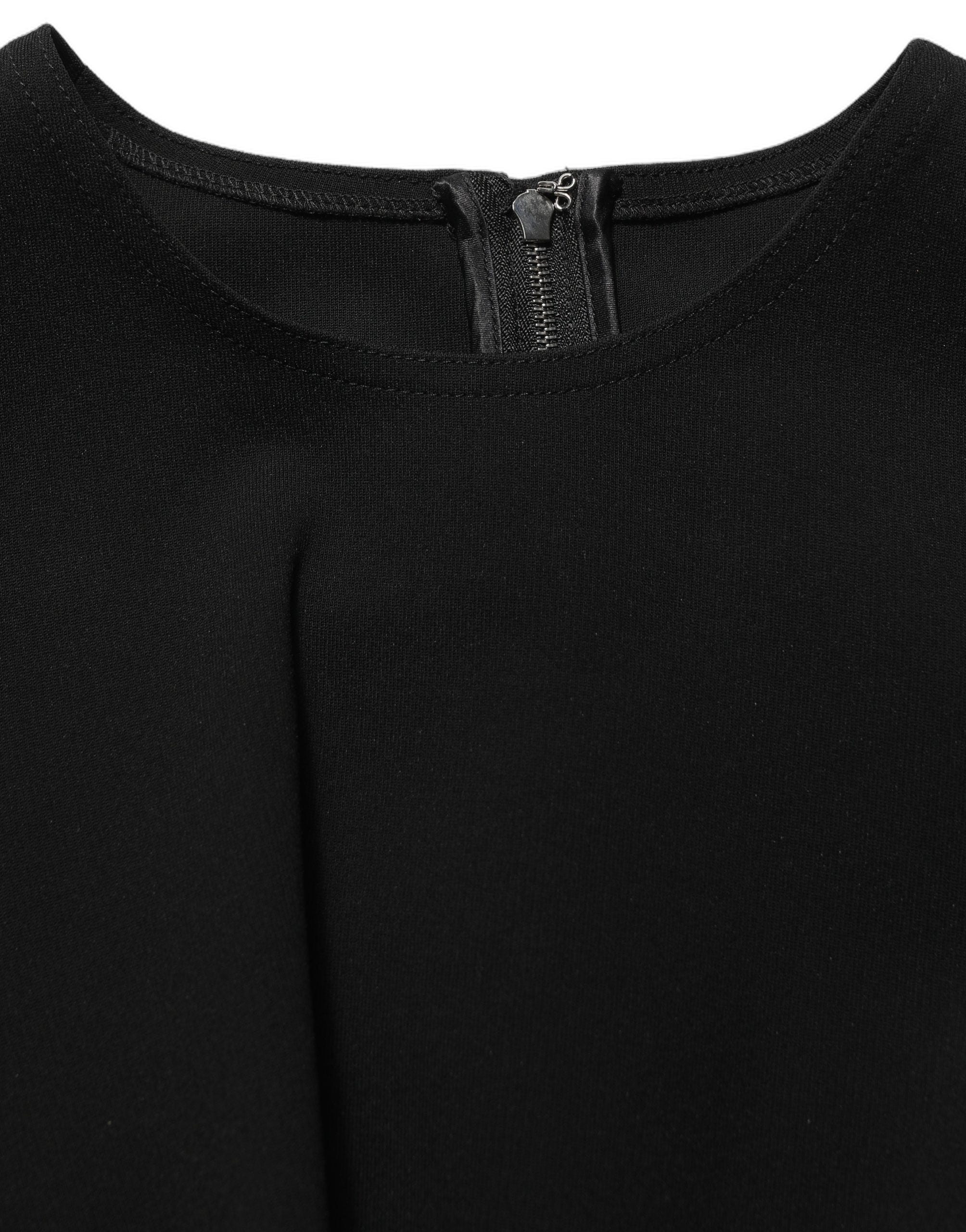 Robe longue sans manches Dolce & Gabbana noire avec détails découpés, style élégant et moderne.