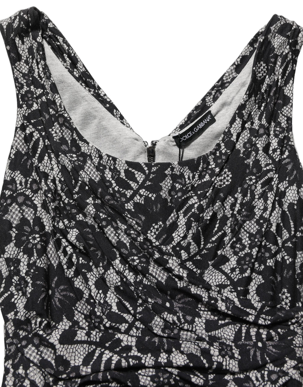Robe midi sans manches Dolce & Gabbana en dentelle florale noire et blanche, élégante et raffinée.