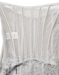 Robe longue Dolce & Gabbana en dentelle grise avec corset de style corset, détails élégants et tissu fin.