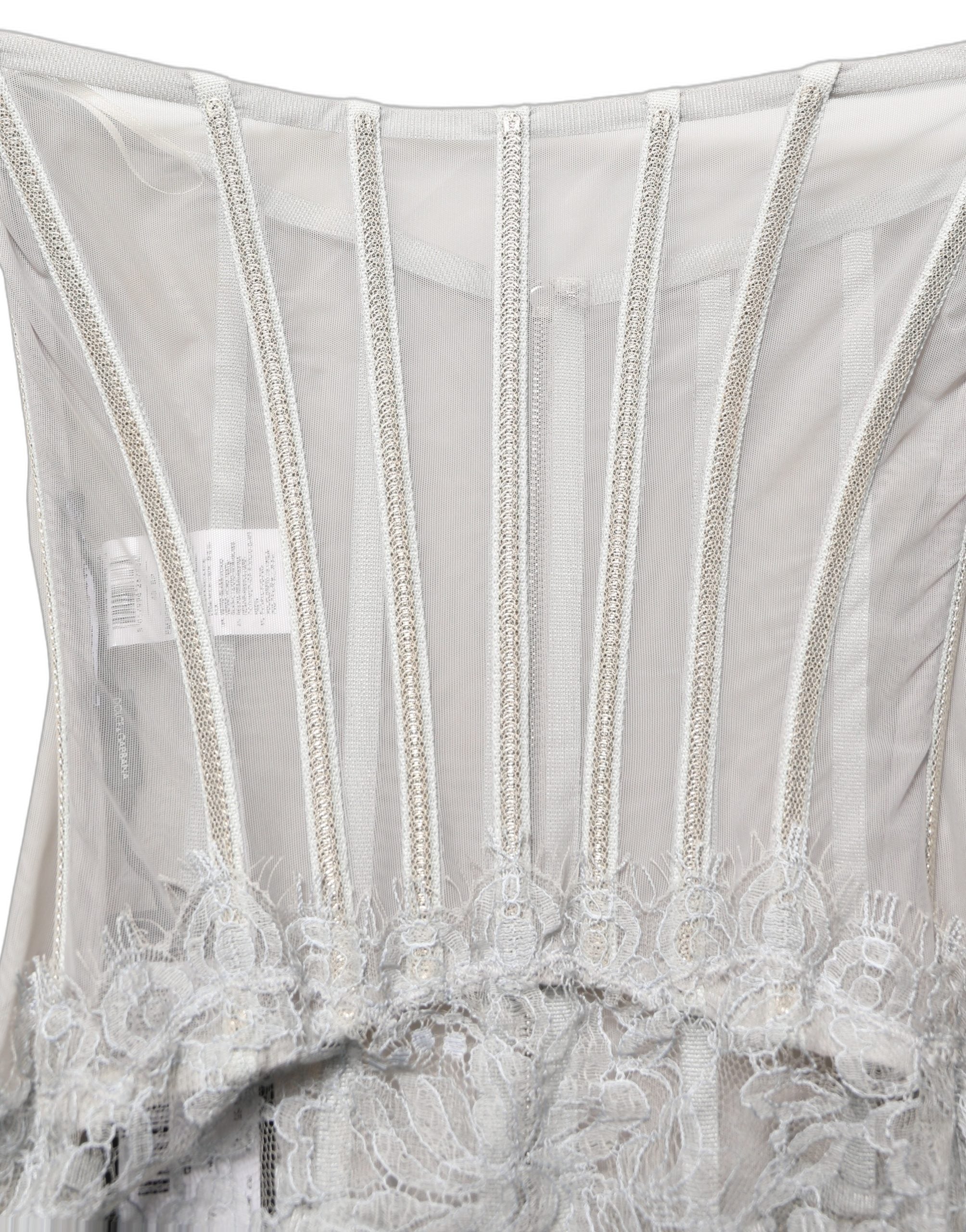 Robe longue Dolce & Gabbana en dentelle grise avec corset de style corset, détails élégants et tissu fin.